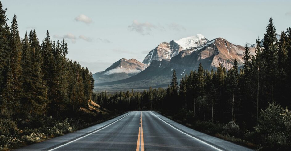 wide road under blue sky