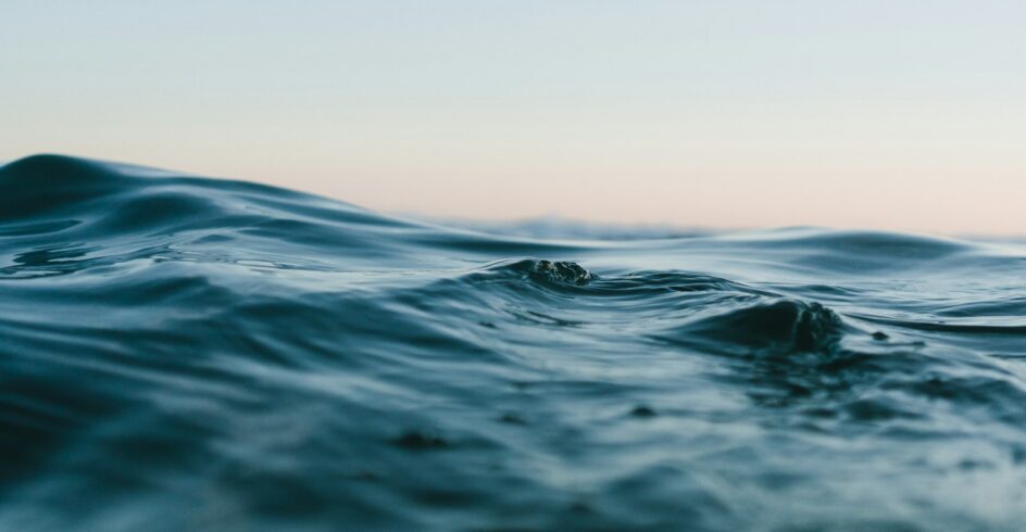 body of water under sky